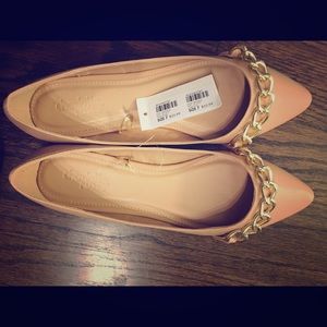 Beige flats with gold chain link. New with tags